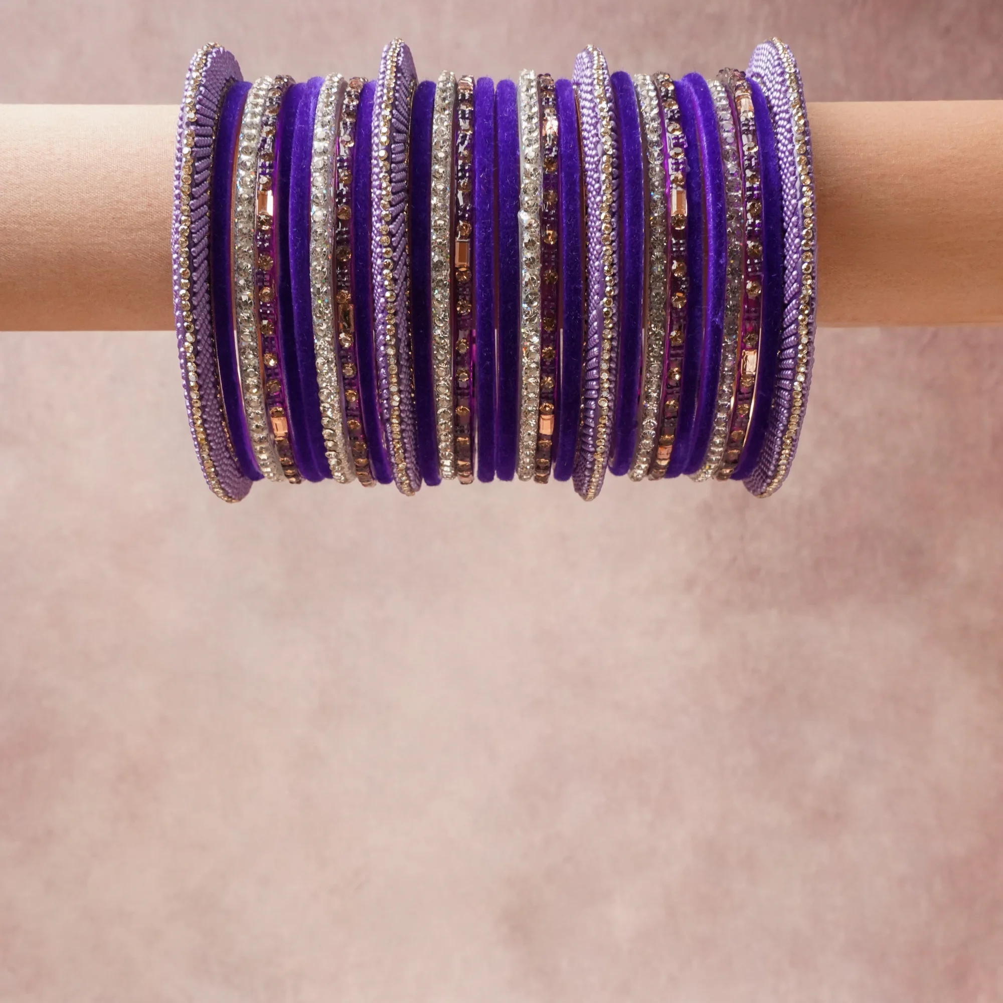 A grounding Royal Purple forms the heart of the set, while touches of Silver, Pale Violet, Rose Gold add charm.

A thoughtful composition of Glass, Metal Alloy, Crystal, Micro-beads, designed to feel complete without being heavy.
Each element layers seamlessly, creating a look that is refined, wearable and quietly striking.